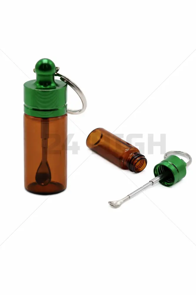 Glass bottle with spoon